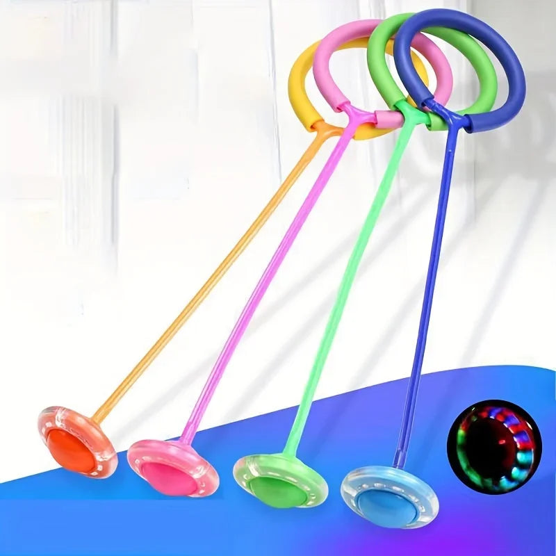 A set of colorful, foldable jump rings or hoops in yellow, pink, green, and blue against a blue background.