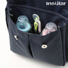 A dark blue waterproof diaper backpack is shown open, displaying various bottles and accessories.