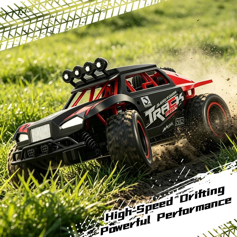 A red and black 1:18 scale high-speed off-road RC monster truck driving through grass.