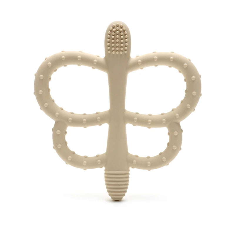 A beige silicone butterfly teether with a textured, segmented design.