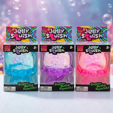 Three boxes of Nee Doh Jelly Squish toys in various colors including blue, purple, and pink.