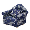 A navy blue floral patterned mini sofa and pillow set for a dollhouse