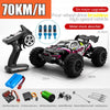 A black brushless 4WD monster truck RC car is shown with various upgrades and accessories.