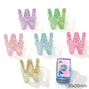 A collection of colorful acrylic letter W beads in various shades including purple, green, pink, and blue.