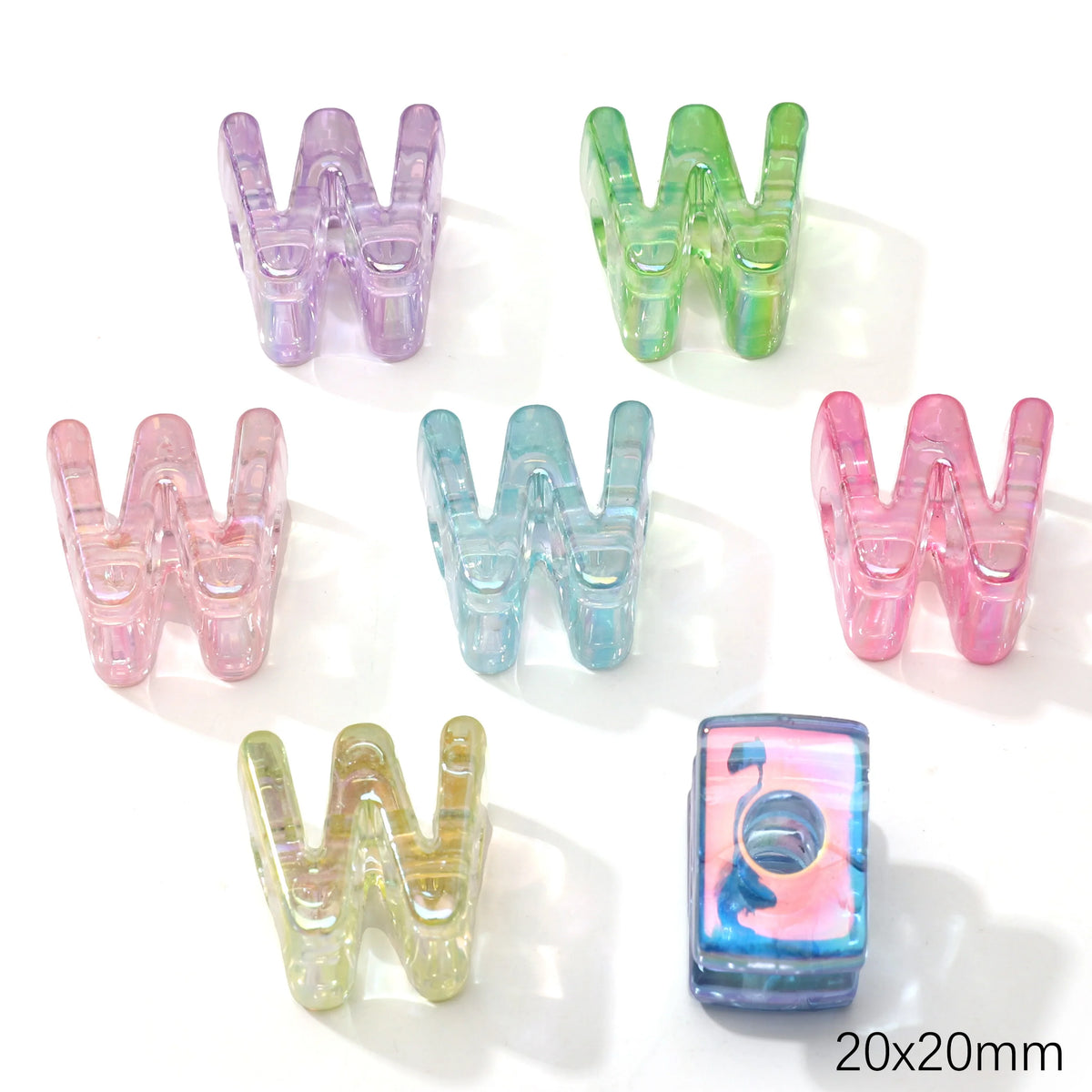 A collection of colorful acrylic letter W beads in various shades including purple, green, pink, and blue.
