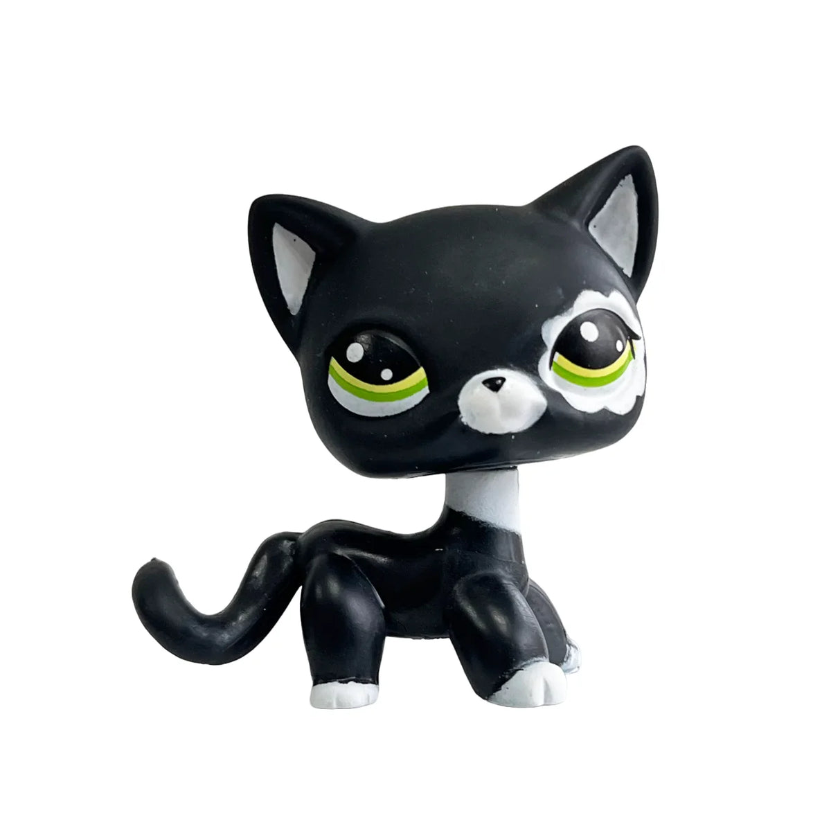 Black and white bobblehead figurine of a dachshund kitten with large eyes
