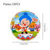 A colorful plate featuring cartoon circus clowns and animals for party decorations.