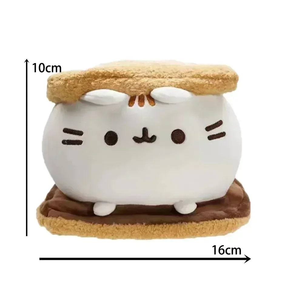 A white, round plush cat toy with orange ears and a brown base, shown next to a measurement scale.