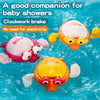 Two duck-shaped swimming bath toys floating in blue water.