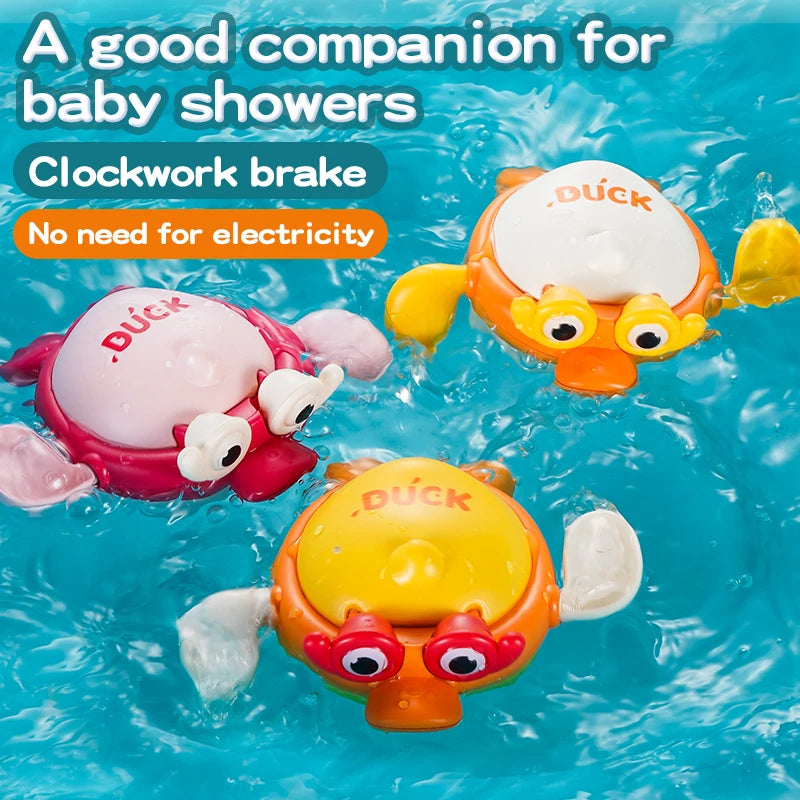Two duck-shaped swimming bath toys floating in blue water.