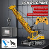 A yellow RC crane truck is shown with a hook, battery, and charging cable, ready for remote control operation.