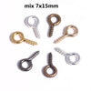 A collection of mini eye pins with screw threads in various metals, including silver, gold, and bronze tones.