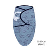 Light blue cotton newborn swaddle blanket featuring a pattern of cute animals and a black trim.