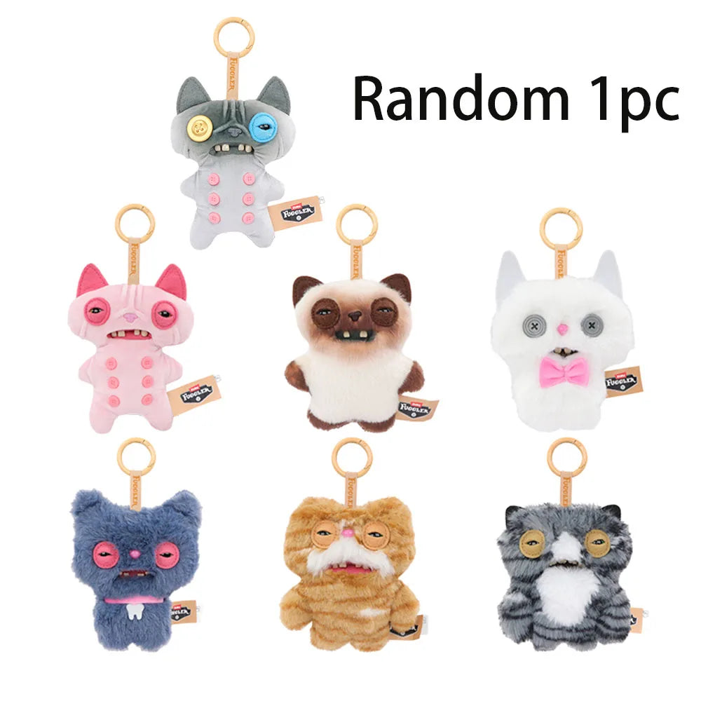 Random plush keychain charms featuring various animal faces like cats and dogs in different colors