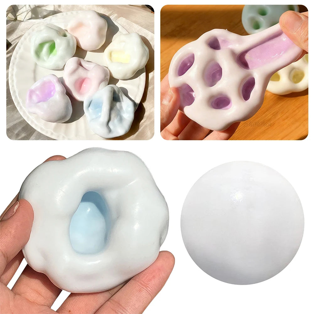 A collection of squishy sand stress balls in various colors and shapes, including a pink, white, and blue oval ball.