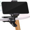 A black phone mount with a rotating mechanism is shown attached to a table surface.