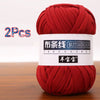 Two skeins of red soft chunky t-shirt yarn for crochet and knitting