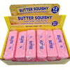 A box of Butter Squishy toys in pink and yellow packaging with twelve squishy items inside.
