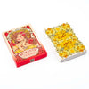A box of the Romantic Lenormand Tarot Card Deck featuring a woman's face surrounded by floral elements.