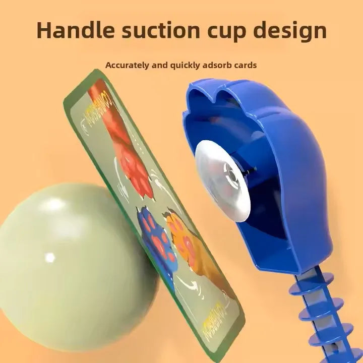 A blue suction cup design tool used to accurately and quickly absorb cards for a Cat & Mouse reaction battle board game.