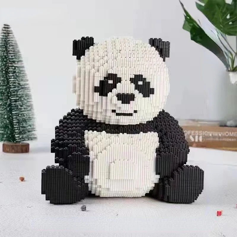 A detailed 3D model of a panda made from black and white building blocks.