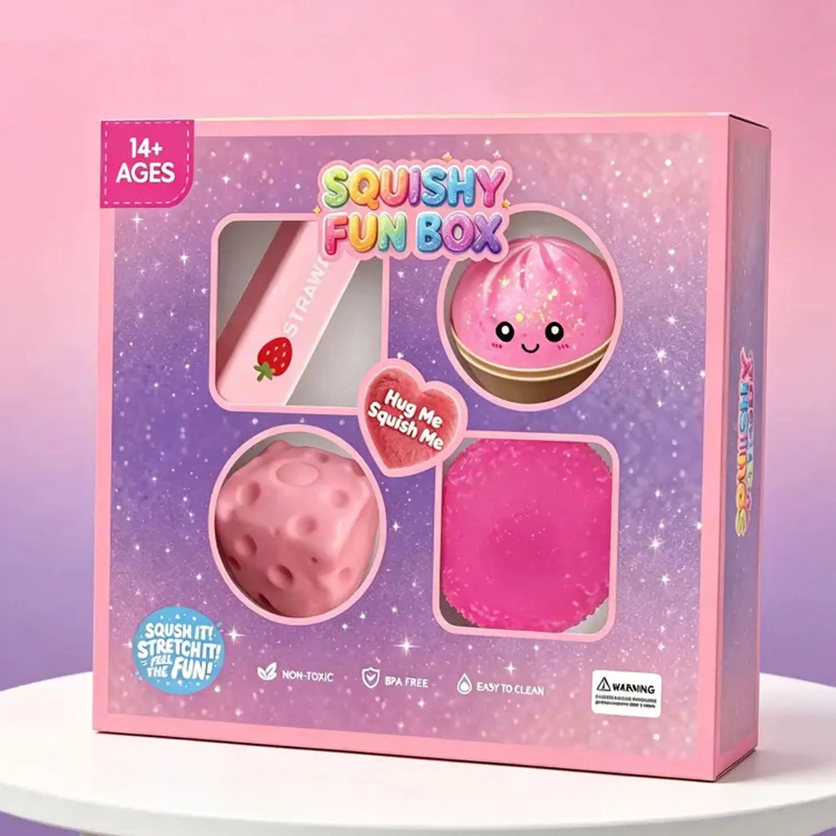 A pink box of Squishy Fun Box containing a pink squishy toy and a pink stress relief toy.