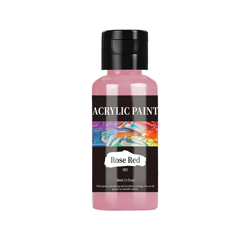 A bottle of pink acrylic paint labeled Rose Red with a black cap.