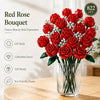 A vibrant red rose bouquet made from DIY building blocks displayed in a glass vase.