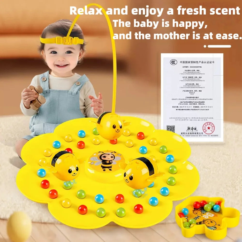 A yellow multifunctional board game and fishing toy set with bee-shaped pieces and a mother and baby in a happy context.