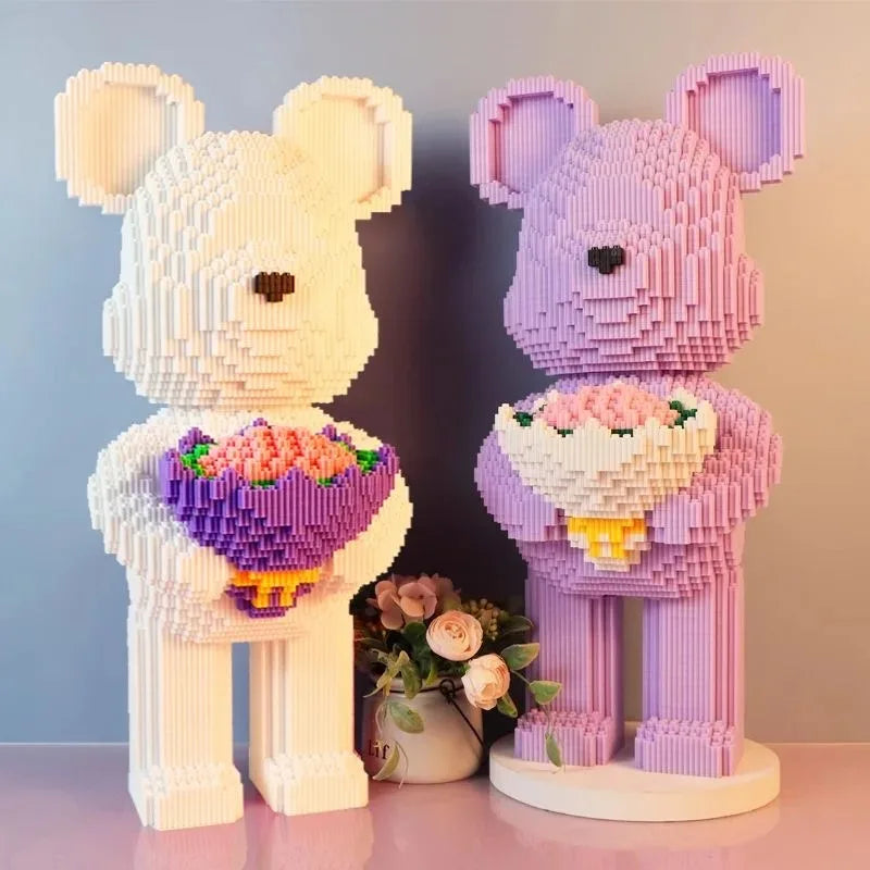 A white and purple flower bear sculpture made from building blocks and micro bricks.