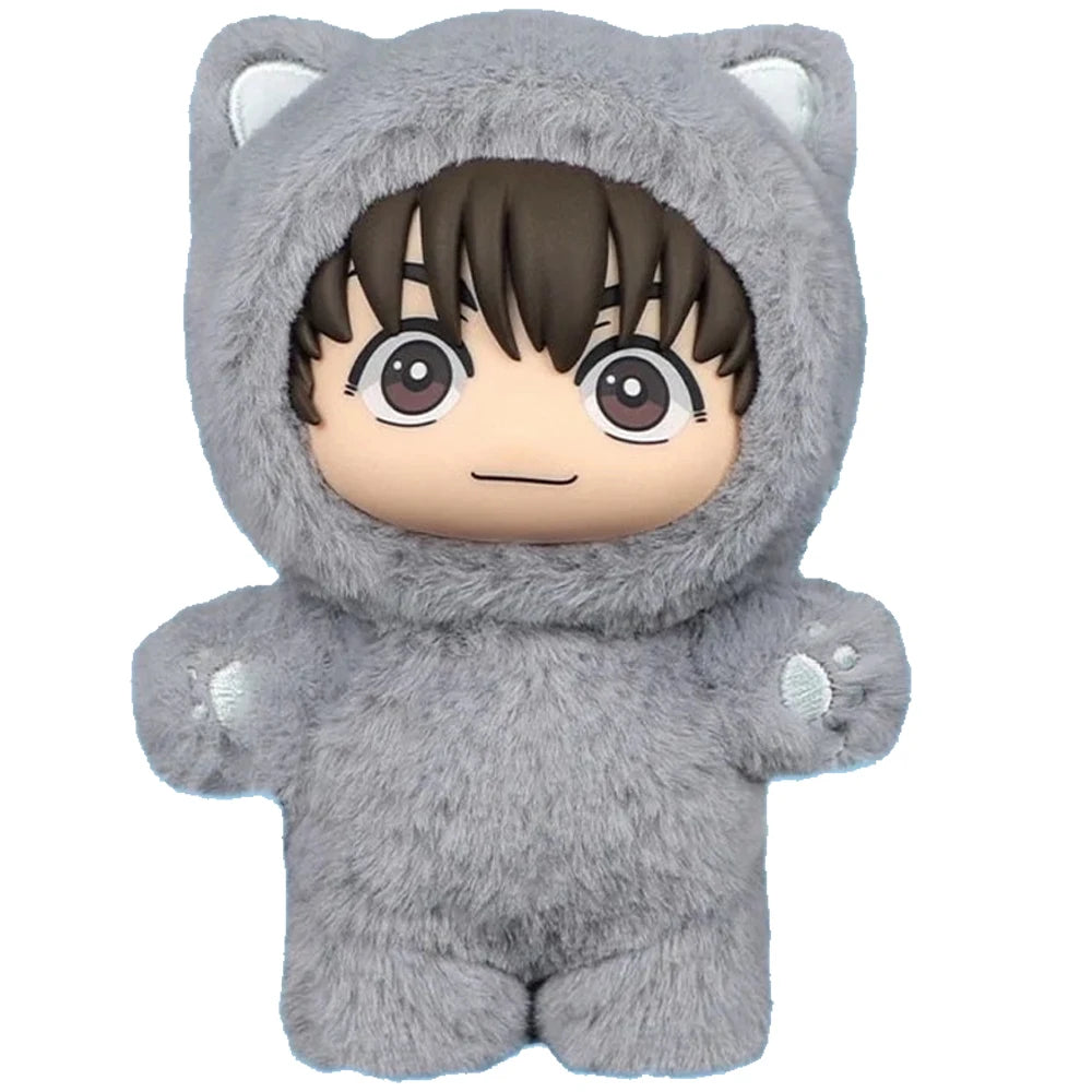 A gray plushie resembling a cat with large ears and a hood, featuring a human-like face.