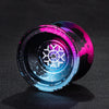A close-up view of a professional aluminum alloy yo-yo with high-speed ball bearings, featuring iridescent purple and blue co