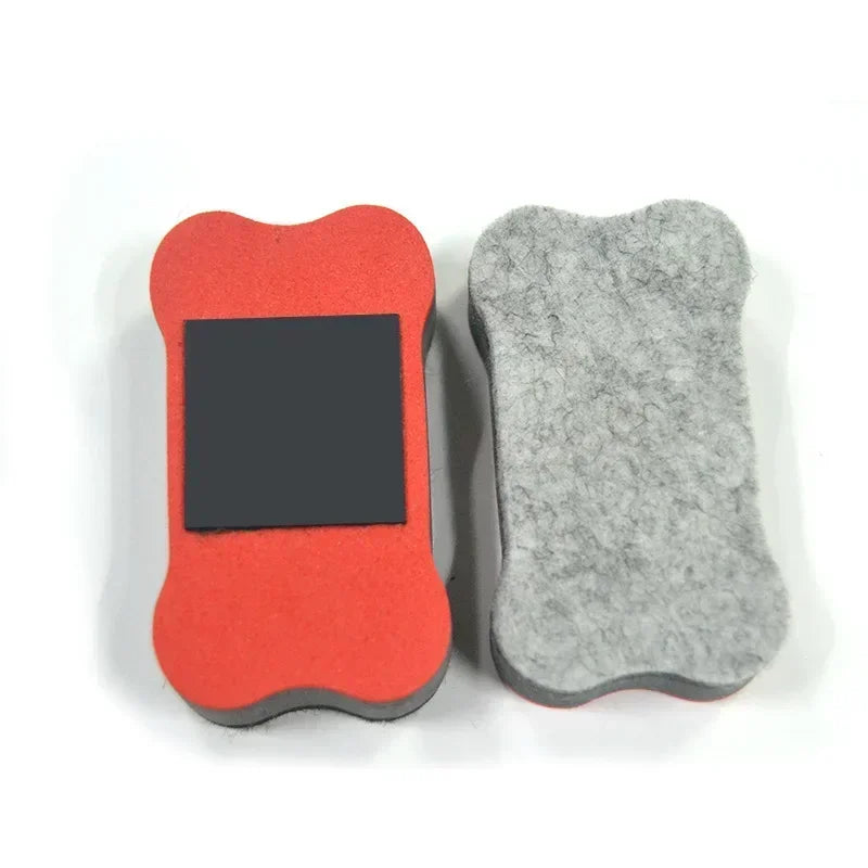 A pair of flexible magnetic dry erase boards, one red and one gray, shaped like a palm print.