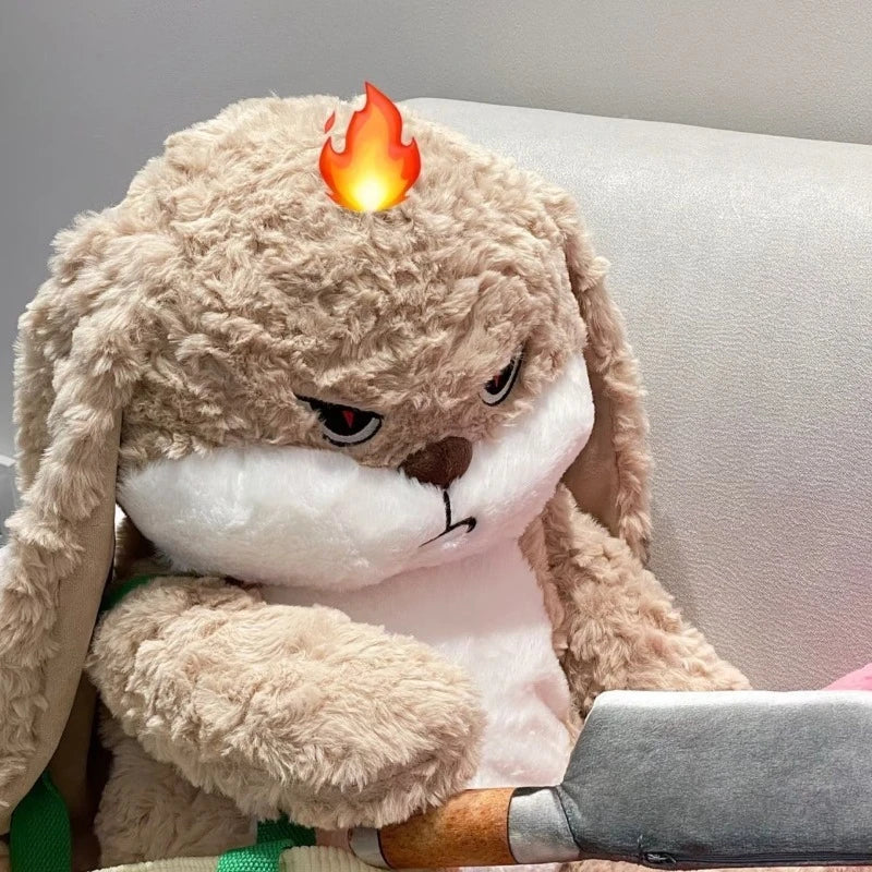A brown rabbit plush doll with angry facial expression and a small flame on its head.