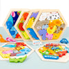 A set of wooden 3D jigsaw puzzles featuring various animal figures and colorful shapes.