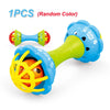 One soft baby grasping ball rattle toy in blue and lime green colors.
