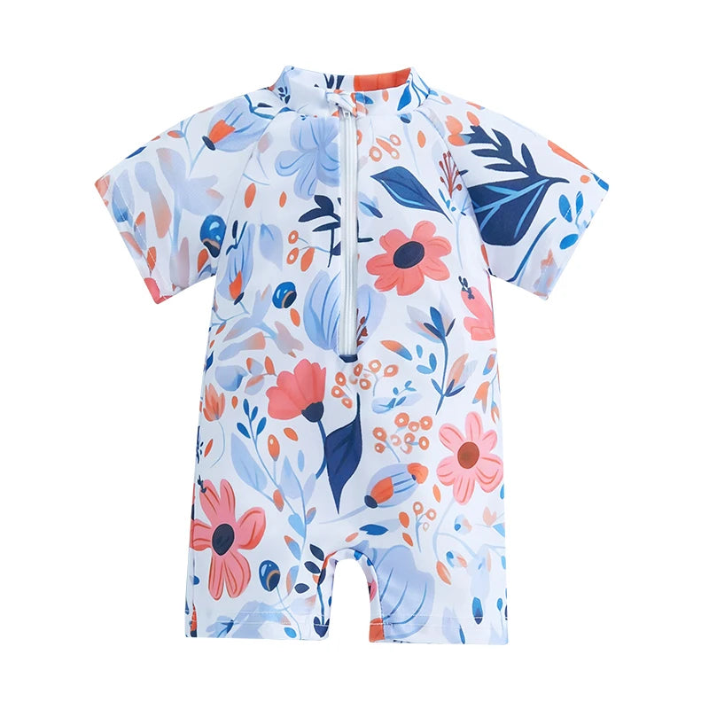 A baby rash guard swimsuit with short sleeves featuring a floral pattern in blue, pink, and white.
