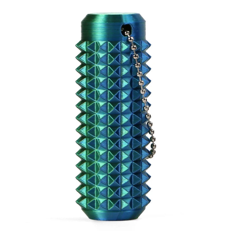 A teal blue 3D printed sensory fidget roller keychain with a textured, diamond-patterned surface.