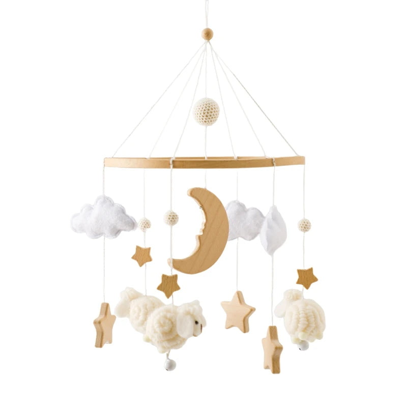 Wooden felt forest animal crib mobile featuring clouds, a crescent moon, and various stuffed animals hanging from thin string