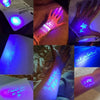 A collection of invisible ink messages written on paper and skin using a UV light, showing various secret notes.