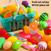 A colorful set of fruit cut toys including plastic fruits, vegetables, and an orange cutting tool for kids
