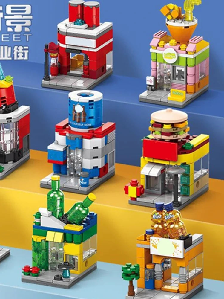 A collection of miniature city shop building blocks featuring various storefronts and buildings in red, yellow, blue, and gre