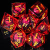 A set of seven red resin polyhedral dice, including a d20 and dodecahedron, displayed against a black background.
