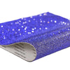 Blue sparkling rhinestone adhesive tape rolled up, showing glittery texture and clear adhesive side.