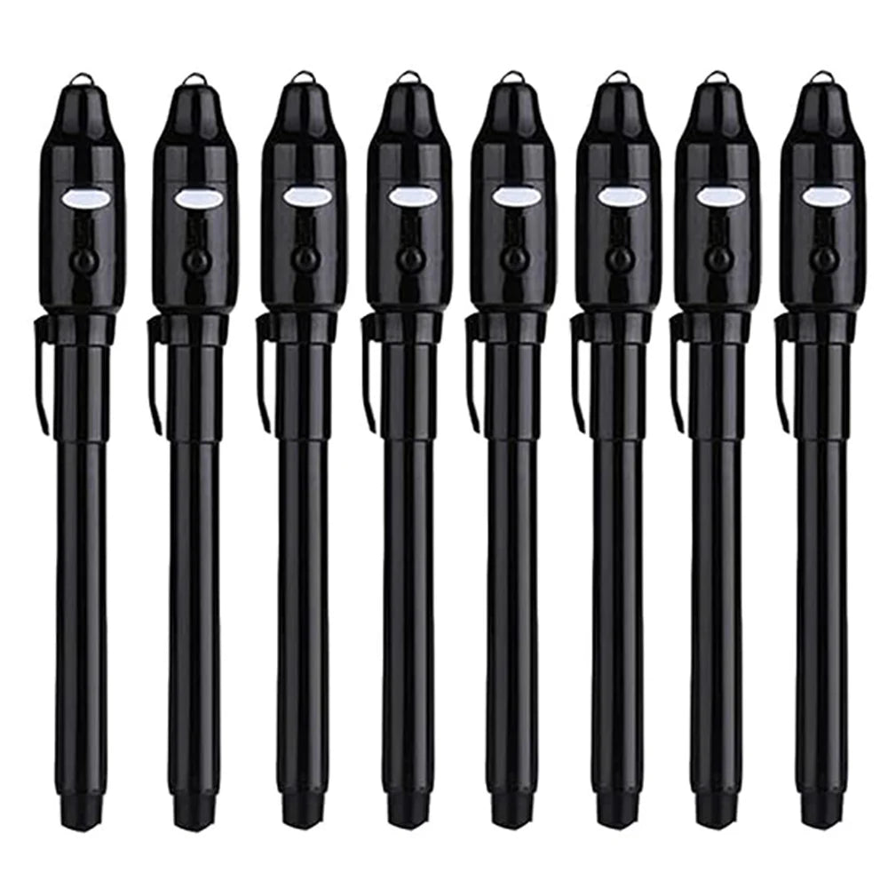 A set of black invisible ink spy pens with UV light for secret messages