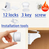 A hand holds a white magnetic cabinet lock and installation tools, showing the product for safety locks.