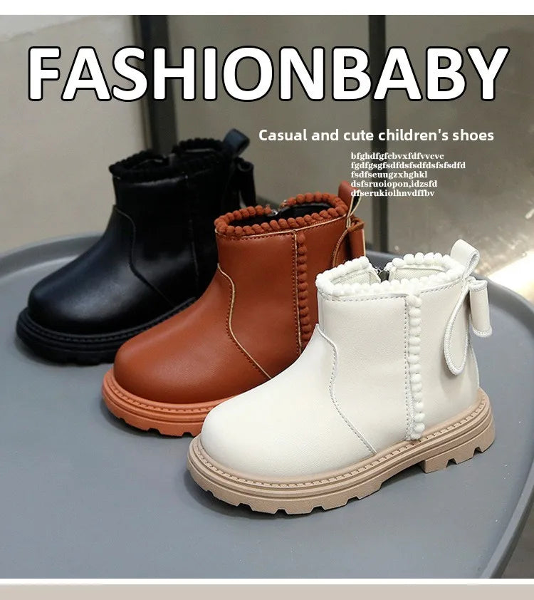 A set of cozy kids winter boots in brown, tan, and cream faux leather finishes displayed on a gray surface.