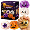 A box of Halloween Mystery squishy stress balls featuring purple, white, and orange pumpkin shapes.