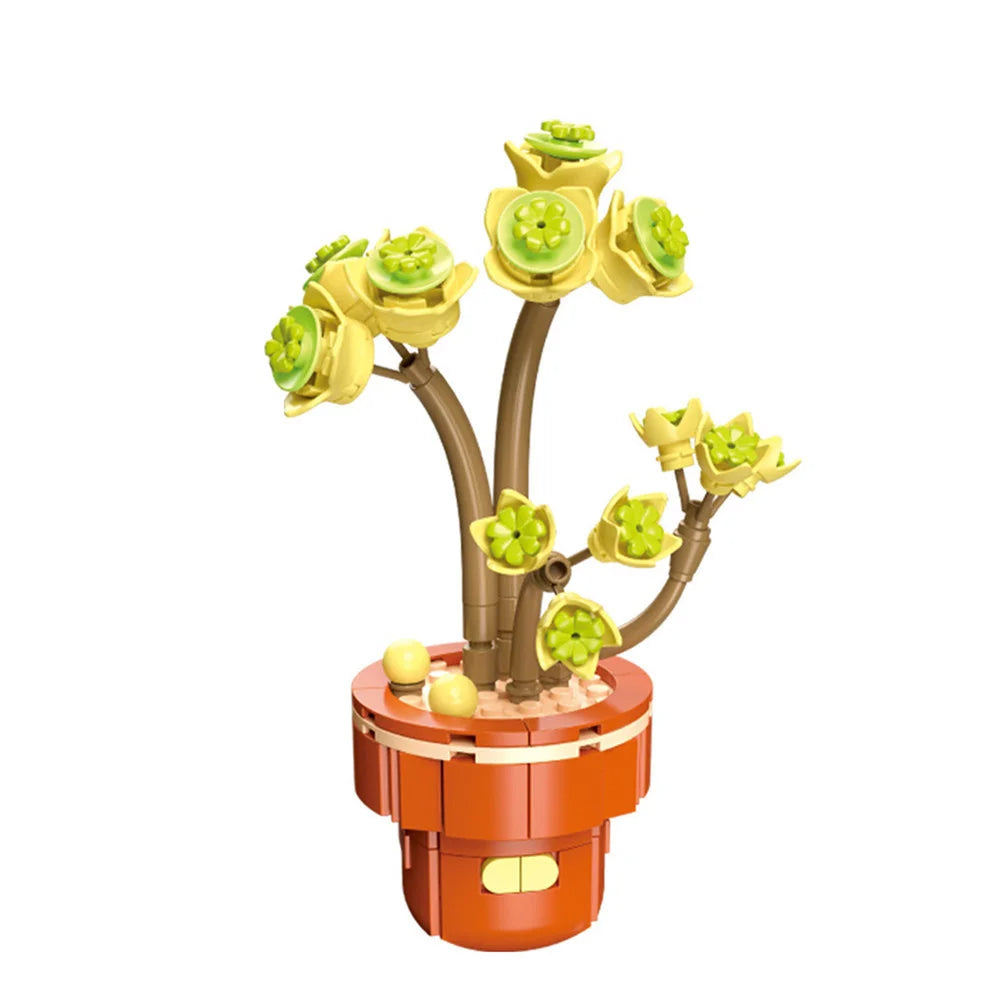 A set of city creativity building blocks shaped like a tree with yellow flowers and green leaves.