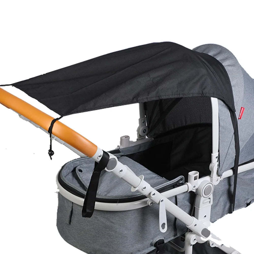A gray and black universal baby stroller sun shade canopy is shown open.